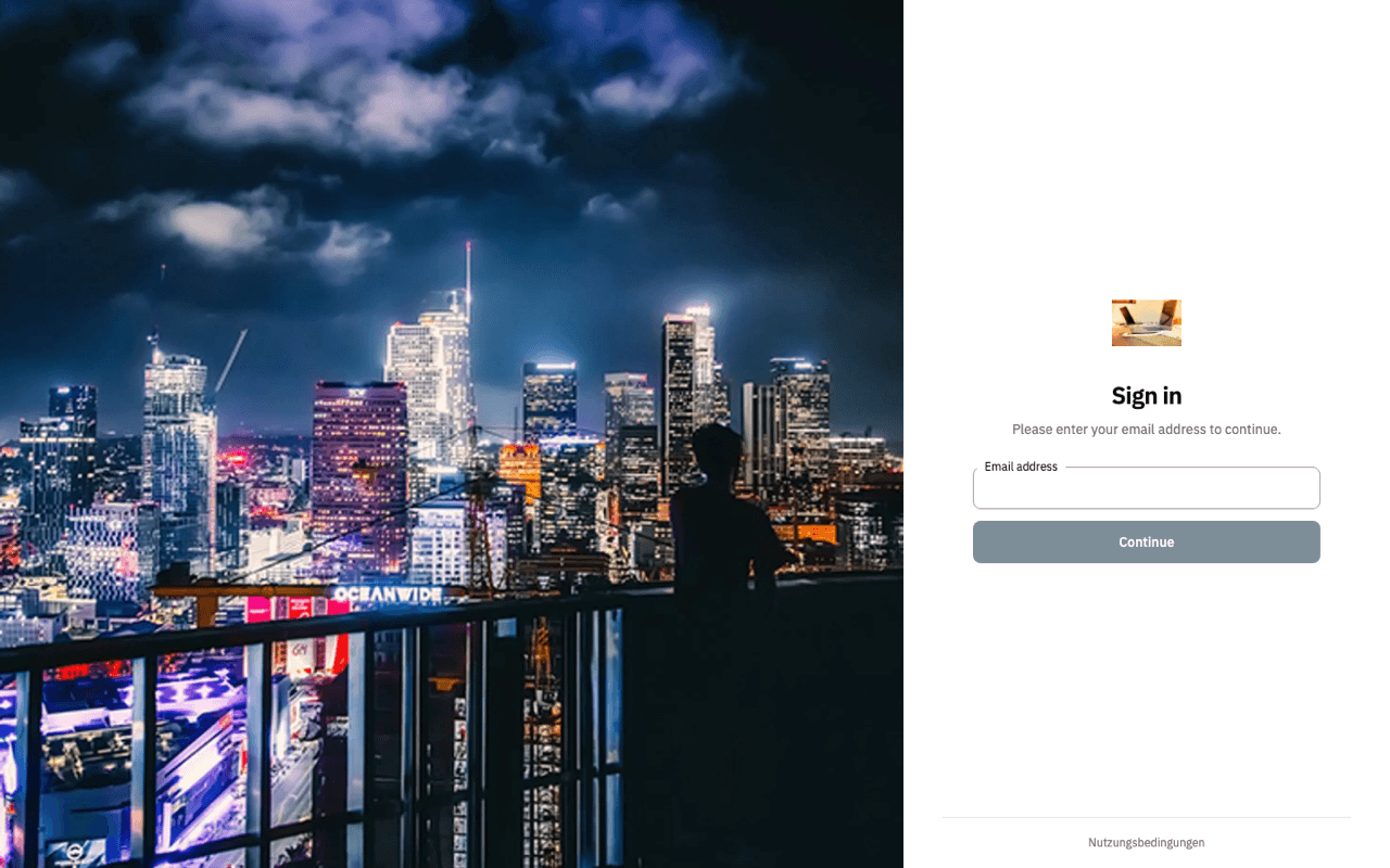 Two-column login page with image, logo and footer